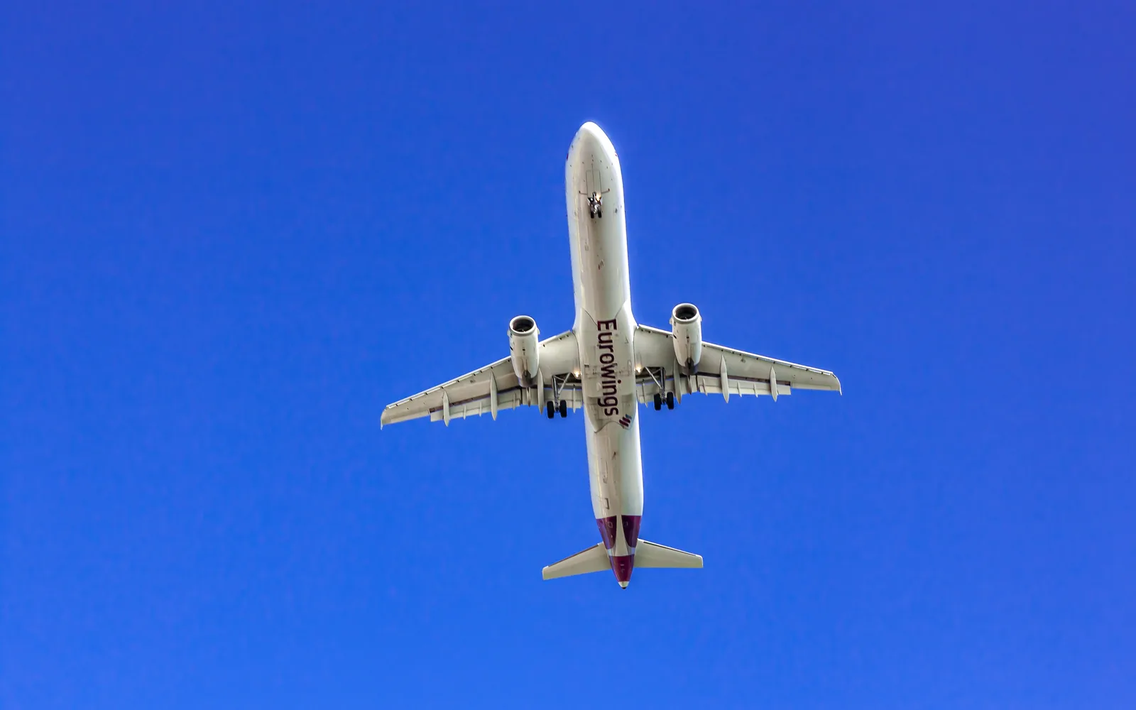Aircraft photographed from below against the sky